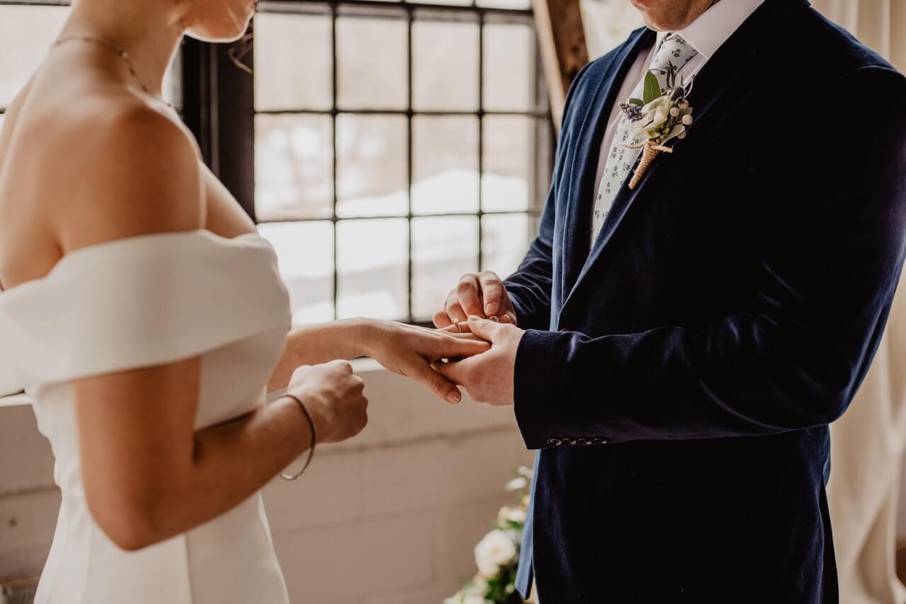 a man and woman holding hands