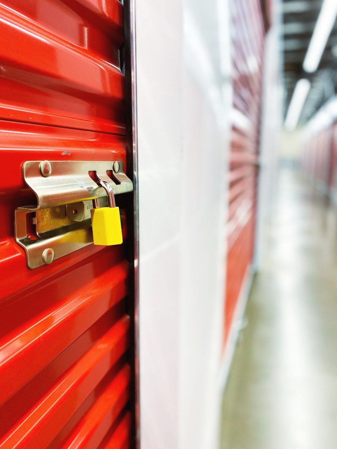 a red and yellow piece of luggage