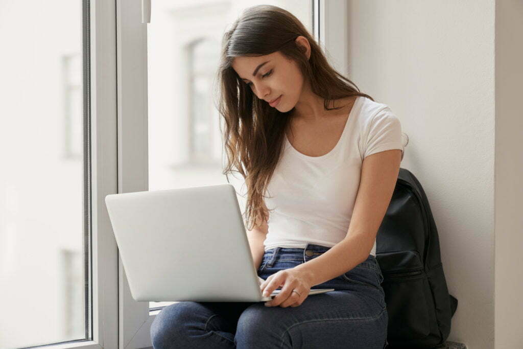 young women working on a laptop